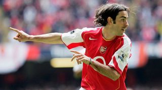 Robert Pires of Arsenal celebrates after scoring his team's first goal during the FA Cup semi-final match between Arsenal and Blackburn Rovers at the Millennium Stadium on April 16, 2005 in Cardiff, United Kingdom.