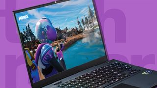 A gaming laptop playing Fortnite, one of the best free games around, against a pink background