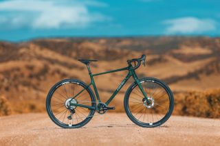 a Niner gravel bike stands in the wild