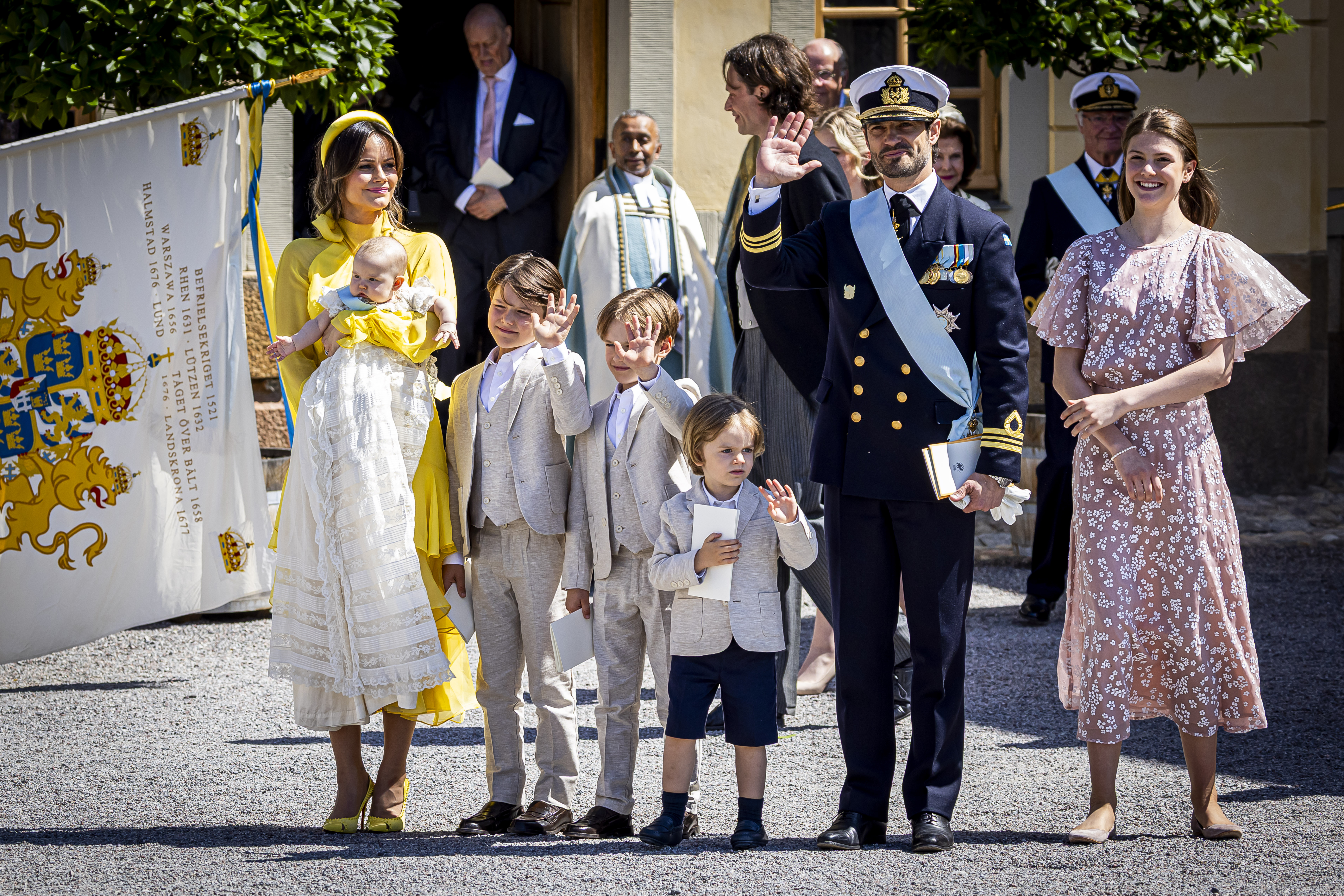 Princess Sofia, Prince Gabriel, Prince Alexander, Prince Julian, Princess Ines, Prince Carl Philip and Princess Estelle smiling and waving at Ines's christening