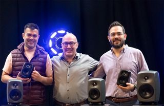 Genelec partners smile and celebrate a new partnership in Mexico.