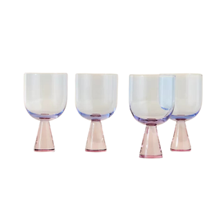 A set of pink and purple colored wine glasses