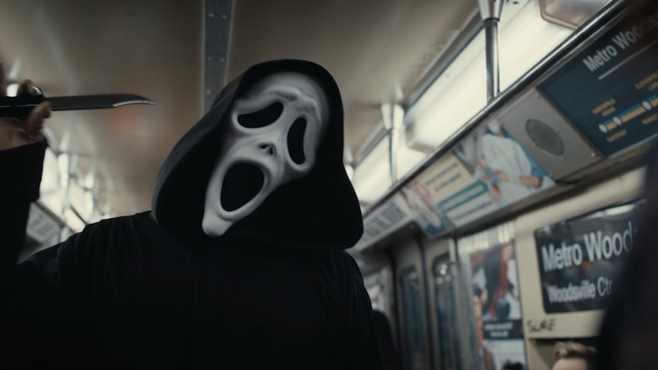 Ghostface holding knife in subway car in Scary Movie 6