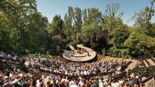 LONDON, ENGLAND - MAY 30:A matinee audience watch a production of Much Ado About Nothing at The Open Air Theatre on May 30, 2009 in Regents Park,London. Warm temperatures herald the start of
