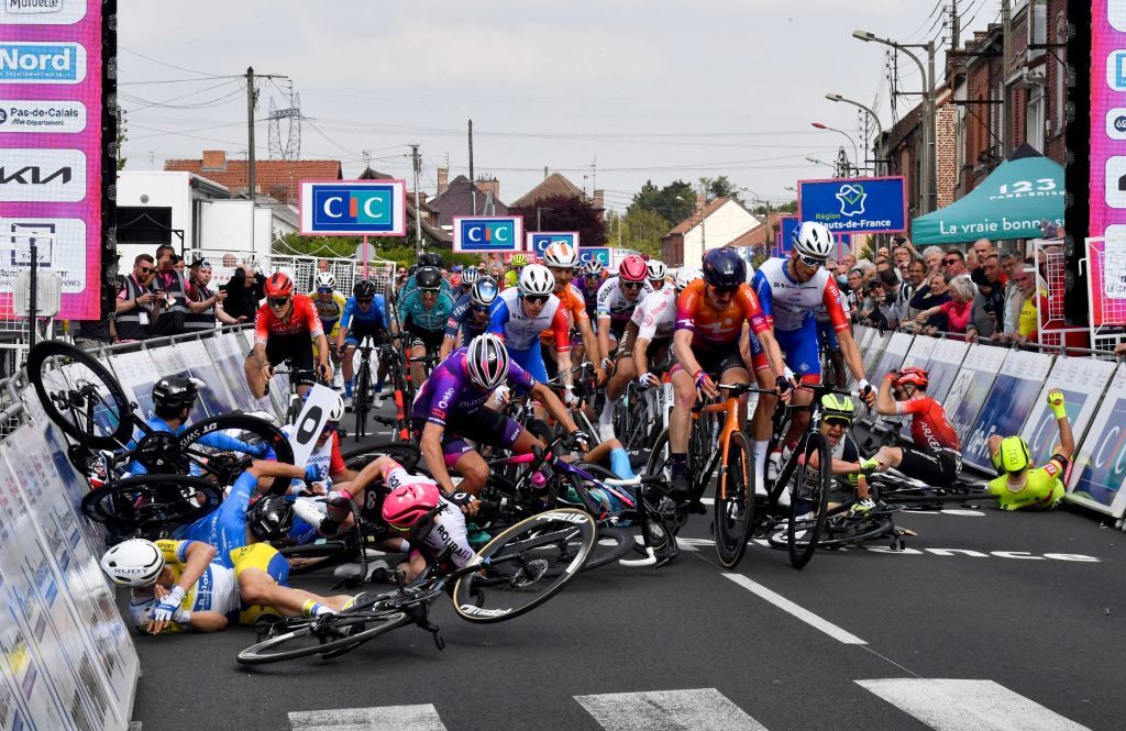 Riders crash as they cross the finish line during the 161 km between Dunkirk and Aniche first stage of the 4 jours de Dunkerque Four days of Dunkirk cycling race in Aniche northern France on May 3 2022 Dutch rider Arvid de Kleijn Human Powered Health was declared winner of the first stage of the Four Days of Dunkerque on May 3 2022 in Aniche after Australian rider Sam Welsford was dropped Welsford Team DSM was the first to cross the line but was considered responsible for the crash that sent Arnaud De Lie Lotto Soudal and Daniel McLay Arkea Samsic to the ground Photo by FRANCOIS LO PRESTI AFP Photo by FRANCOIS LO PRESTIAFP via Getty Images