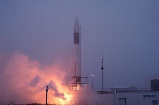 Privately-Built Falcon 1 Rocket Roars on the Pad