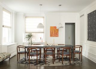 A dining room with wooden flooring