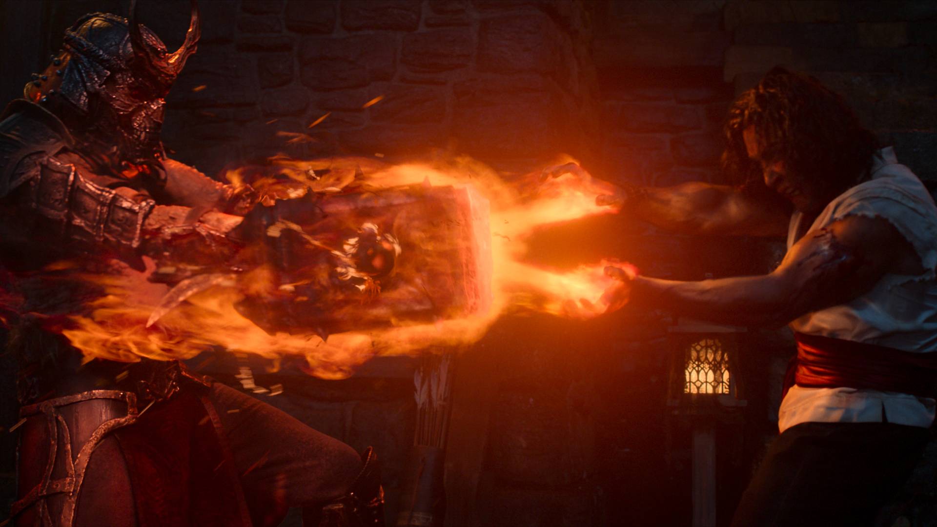 Liu Kang (Ludi Lin) and Shao Kahn (Martyn Ford) fight fire with hammer