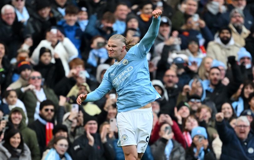 Erling Haaland celebrates scoring his 50th Premier League goal