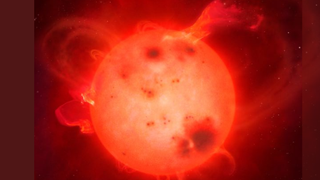 A glowing red orb is seen on the verge of exploding out a flare.