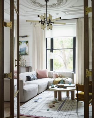cream corner sofa in modern living room by Gunter & Co