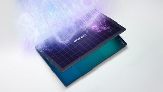 The Yoga Solar PC Laptop from Lenovo with visual effects showing how sunlight would hit the top of the laptop lid where solar panels are embedded.