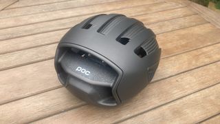 POC Cytal Carbon helmet seen from the rear on a wooden table