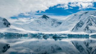 Photo of antarctic mountains near a body of water