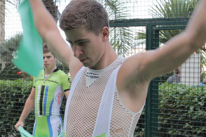 Peter and Juraj Sagan during a stretching exercise at the Tinkoff-Saxo training camp.