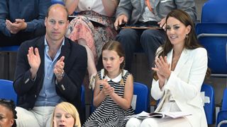 Prince William, Duke of Cambridge, Catherine, Duchess of Cambridge and Princess Charlotte of Cambridge attend the Sandwell Aquatics Centre