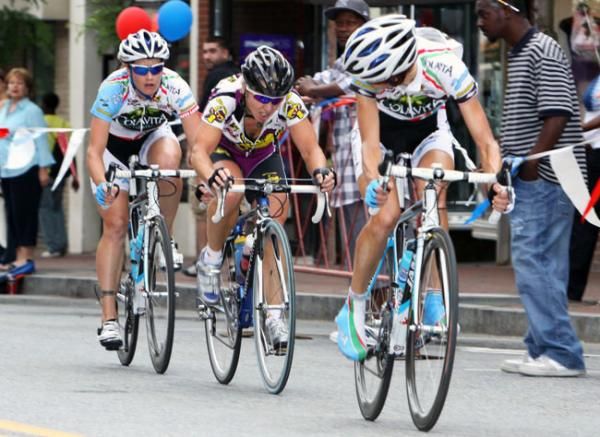 Team Colavita's Cath Cheatley and Shontell Gauthier "sandwich" Laura Van Gilder from Mellow Mushroom.