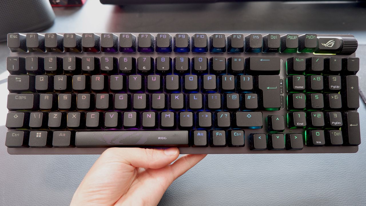 Asus ROG Strix Scope II 96 Wireless gaming keyboard on a desk.