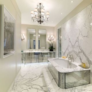 bathroom with marble and mirror