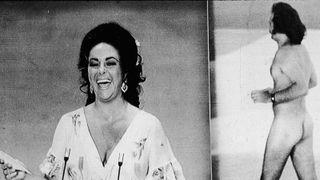 British-born actress Elizabeth Taylor laughs as she remarks that she was upstaged by streaker Robert Opal before presenting the Oscar for Best Picture at the 46th Annual Academy Awards ceremony, Los Angeles, California, April 2, 1974. At right, Opal darts across the stage naked just as David Niven was introducing Taylor.