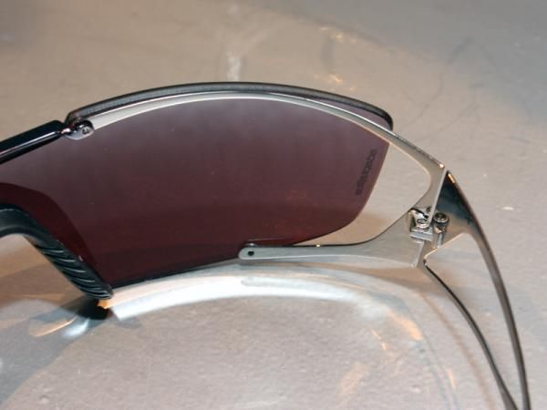 The minimal stainless steel frame is barely attaches to the lens.