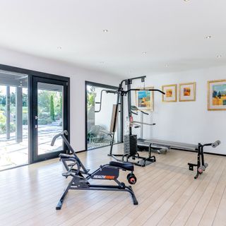 lincolnshire huf house gym with wildwood flooring and gym instruments
