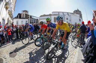 Geraint Thomas, in yellow, starts the final stage at Volta ao Algarve