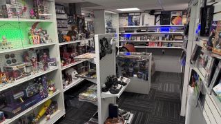Photographs of custom game store collection display with dozens of games and boxes on shelves