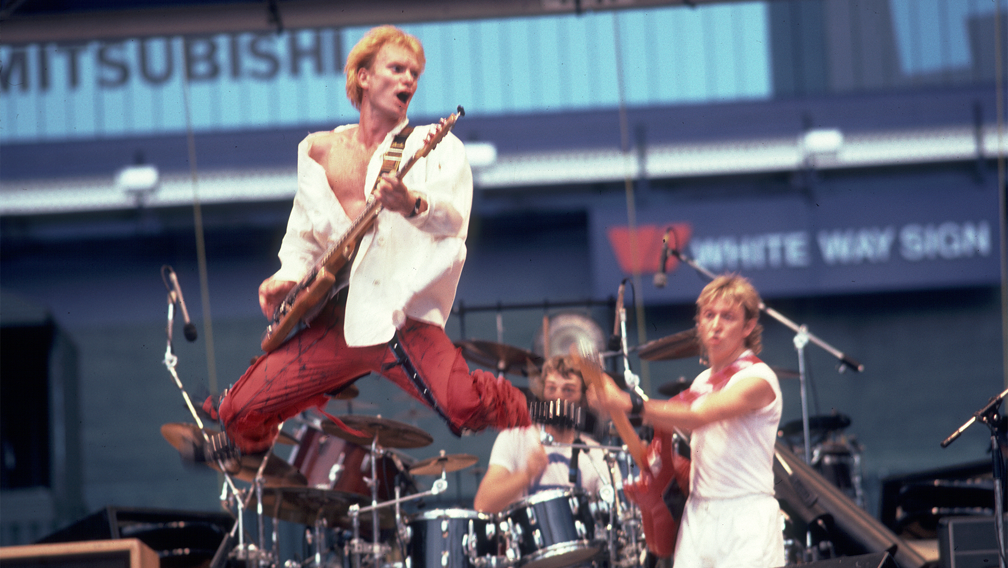 Sting, Stewart Copeland and Andy Summers of the Police performs on stage at Comiskey Park in Chicago, Illinois, July 23, 1984.