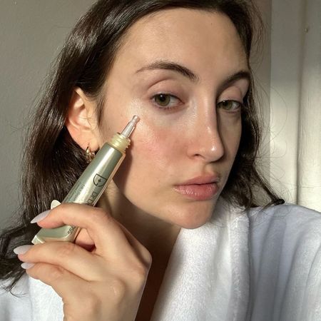 Alyssa Brascia using the Dr. Dennis Gross DermInfusions Fill + Repair Eye Cream