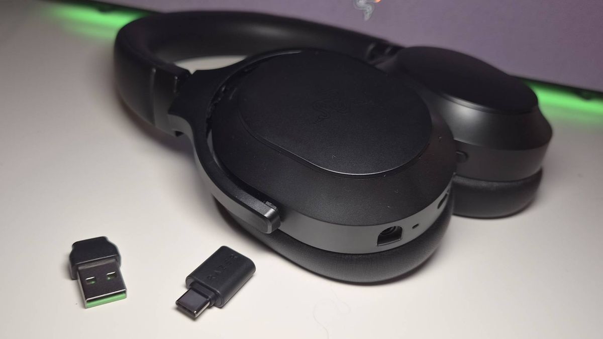 Photo of the Razer Barracuda V2 Pro headset sitting on a white desk.