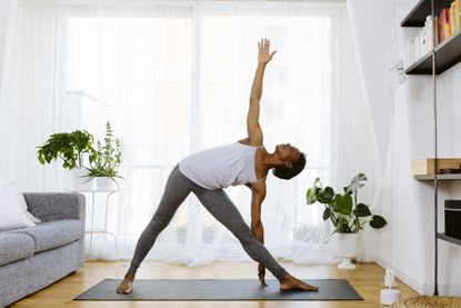 Menopause yoga: a woman practicing yoga