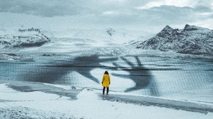 Photo collage of a lone woman facing a polar landscape. There is a frozen lake in front of her, with an overlaid large-scale photo of a woman's hands pressed against a pane of glass, as if trapped under the ice in distress. The woman's small silhouette is framed between the large hands
