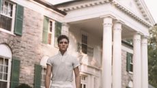 elvis presley in front of graceland