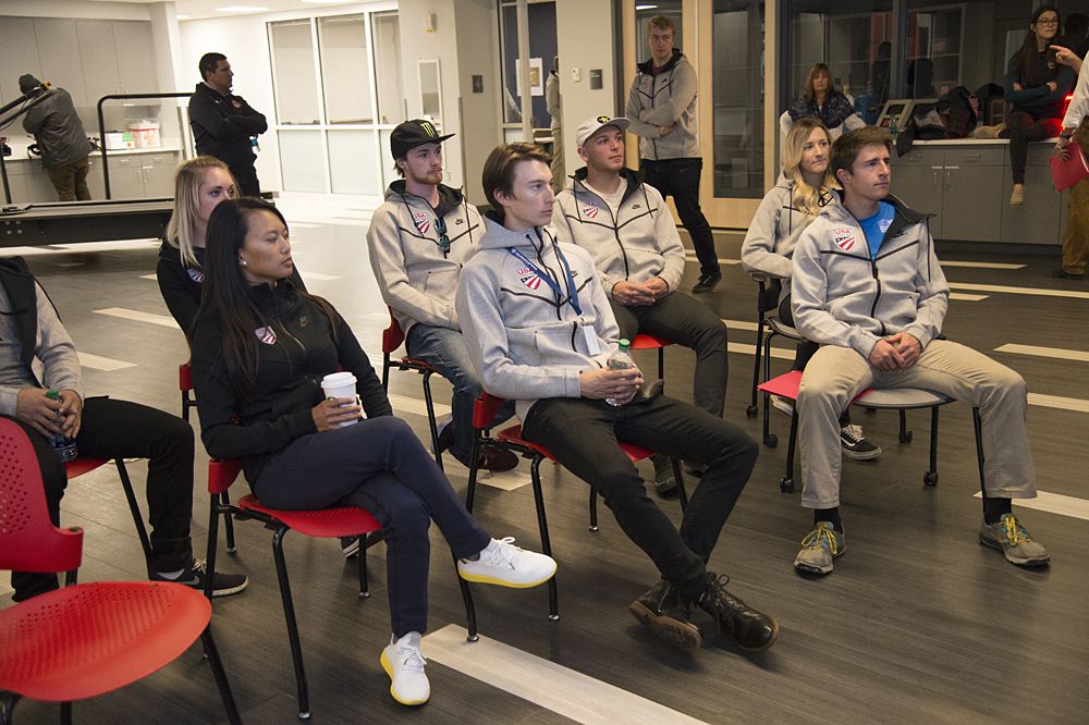 Team members and staff in the USOC physiology lab, learning about services provided by the USOC.