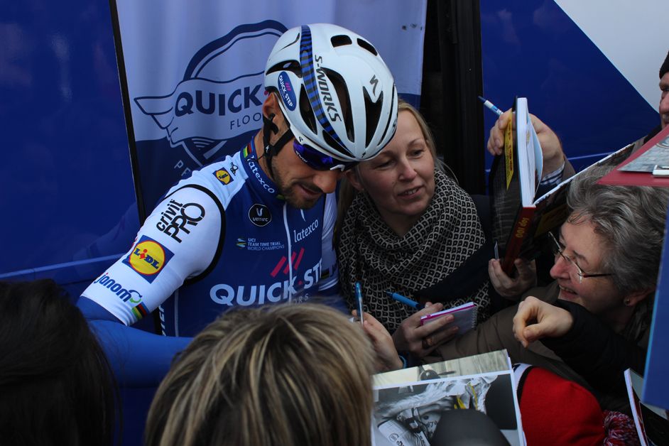Boonen is immediately mobbed as he steps of the Quick-Step bus
