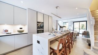 white kitchen with mood lighting