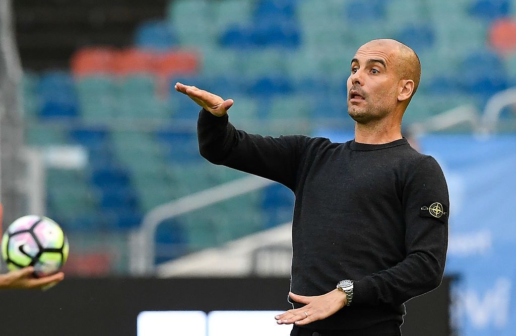 Manchester City's Spanish head coach Pep Guardiola reacts during the friendly football match between Arsenal and Manchester City at the Ullevi stadium in Gothenburg on August 7, 2016. / AFP /