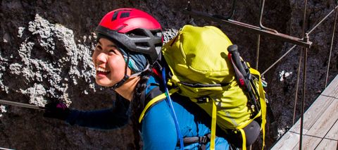 Woman climbing in a Black Diamond Speed 30 backpack 