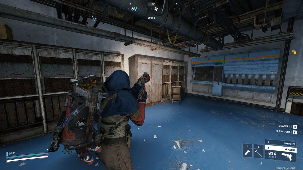 Arc Raiders Geiger Counter: A player looking at a server cabinet in a dark workshop using a flashlight.