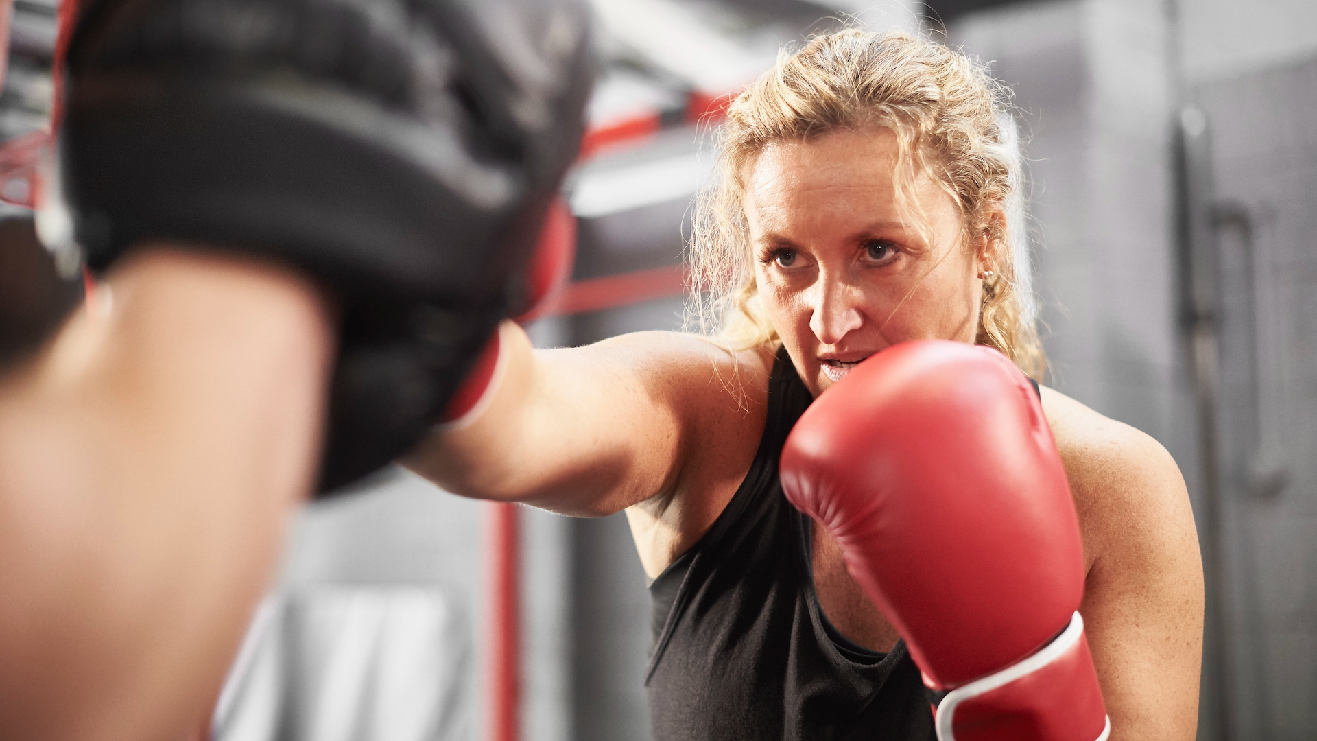 Woman doing a boxing personal training session