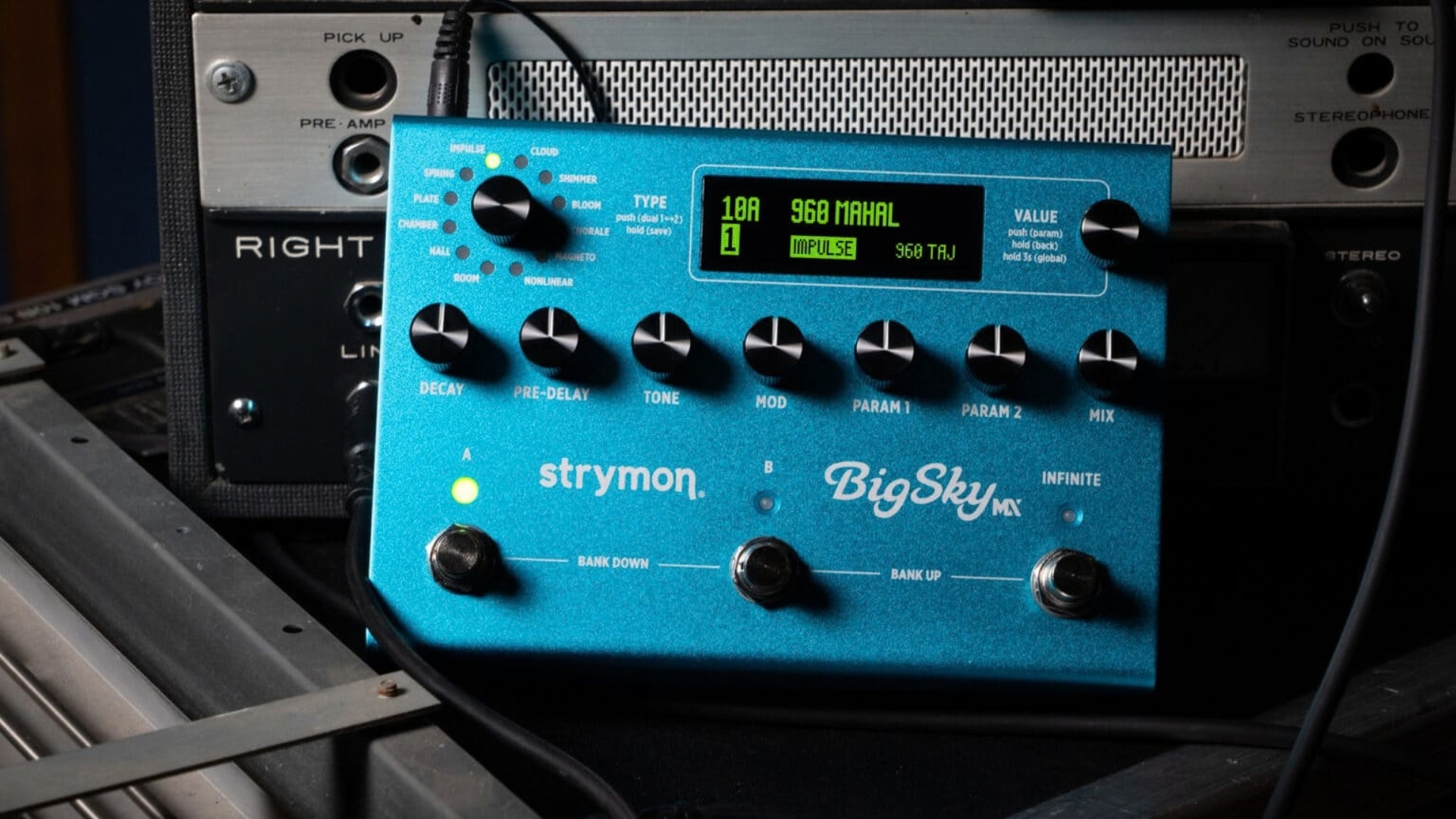 A Strymon BigSky MX reverb pedal in front of some studio gear