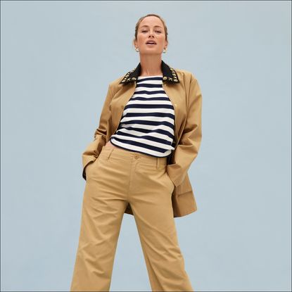 Woman wearing a Breton striped top by J. Crew