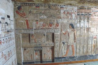 artwork in an ancient egyptian tomb.