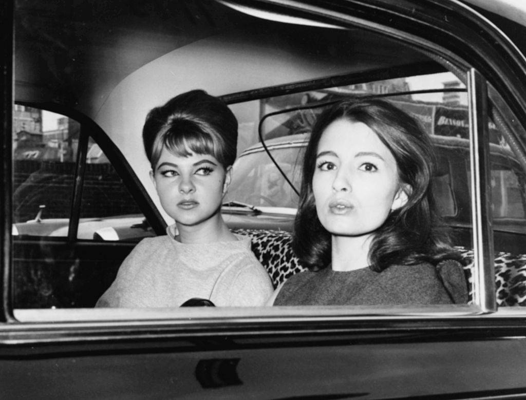 Mandy Rice-Davies (left) and Christine Keeler in 1963