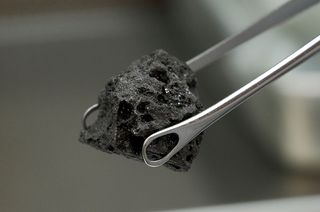 An example of an Apollo moon rock. NASA has not released a photo of the rock a Calif. woman tried to sell. 