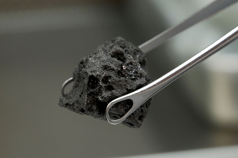 An example of an Apollo moon rock. NASA has not released a photo of the rock a Calif. woman tried to sell. 