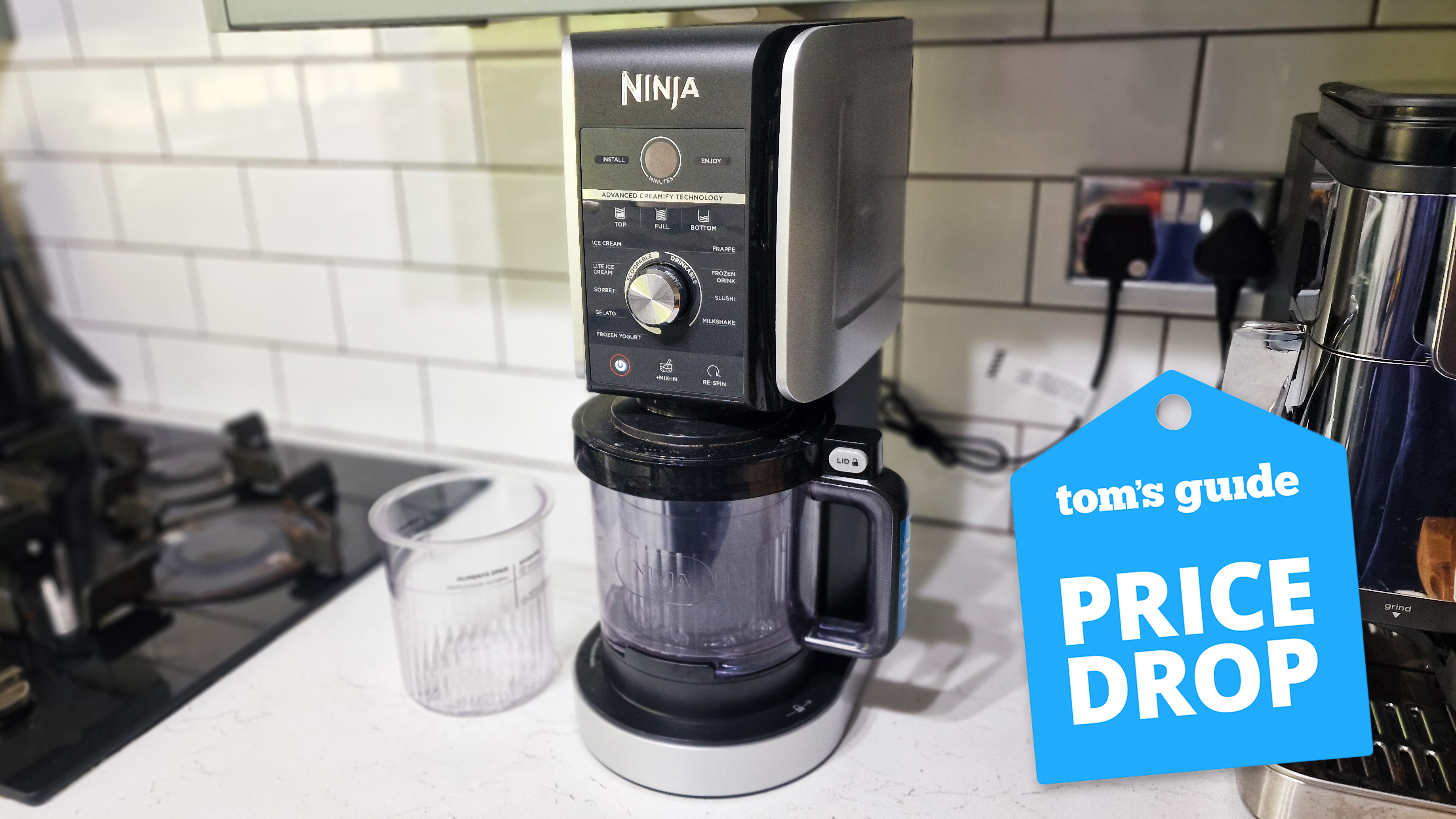 the ninja creami photographed in a kitchen with a tom&#039;s guide deal badge on top