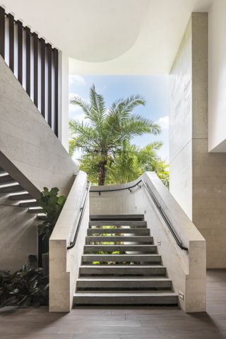 dramatic sculptural staircase at Fairchild Grove housing by Strang Design and Rafael de Cárdenas
