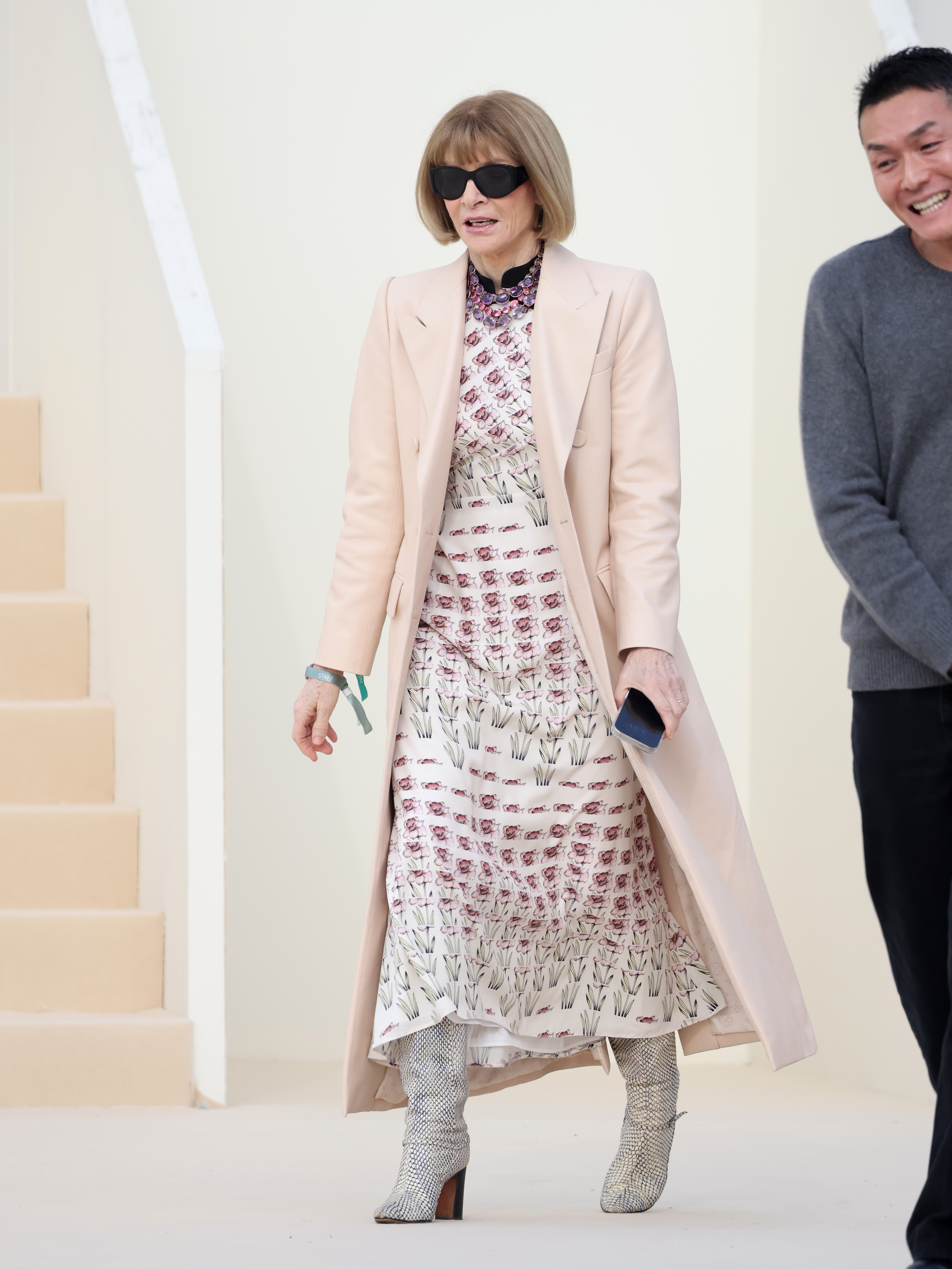 Anna Wintour wears snake-print boots in Paris